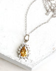 Curated Aura Pear Halo Necklace Andrea Bonelli Jewelry