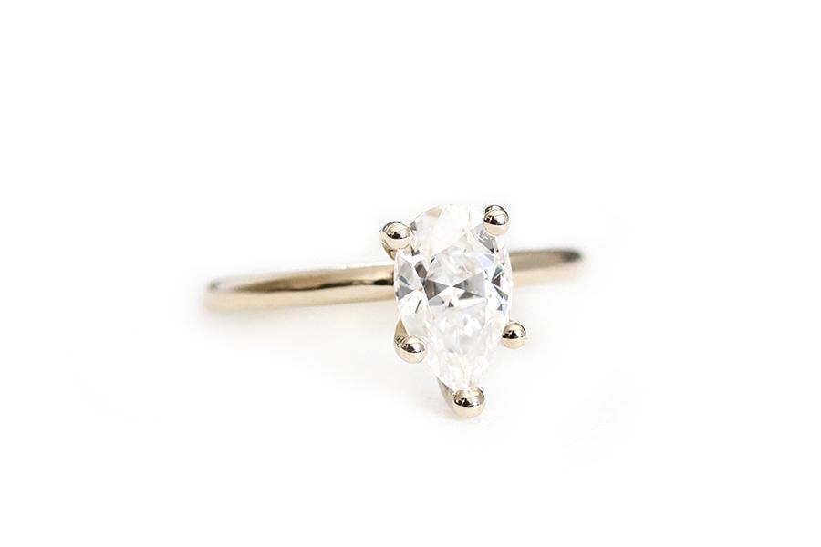 Isa pear moissanite ring Andrea Bonelli 14k Yellow Gold