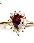 Aura Halo Pear Garnet Ring Andrea Bonelli Jewelry 