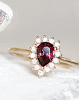 Aura Halo Pear Garnet Ring Andrea Bonelli Jewelry 